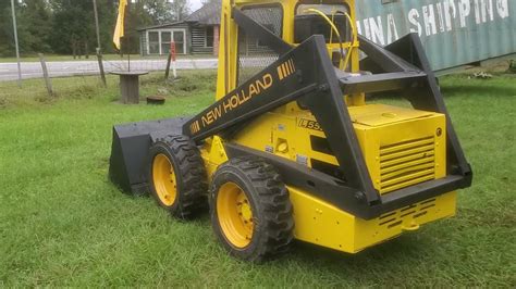 1975 new holland skid steer|new holland l555 for sale.